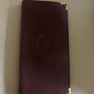Authentic Cartier Burgundy Leather Wallet with Gold Accents